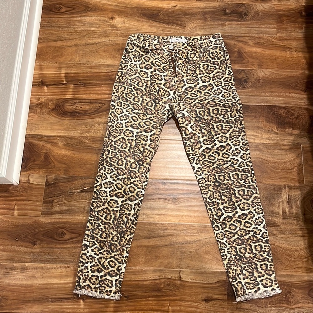 Cheetah print jeans, frayed bottom